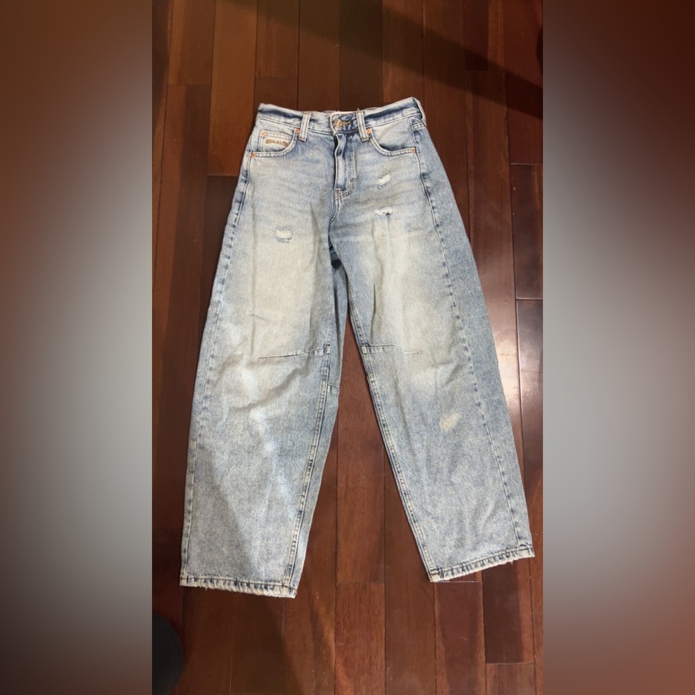 Light blue distressed wide leg jeans
